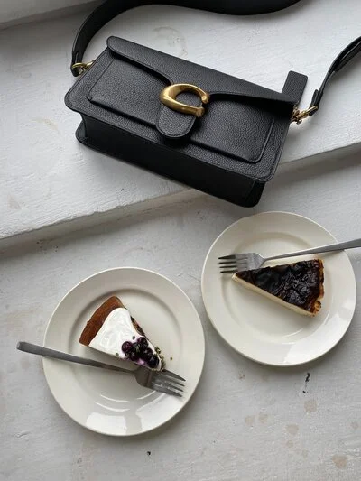 sling bag and slice of cake
